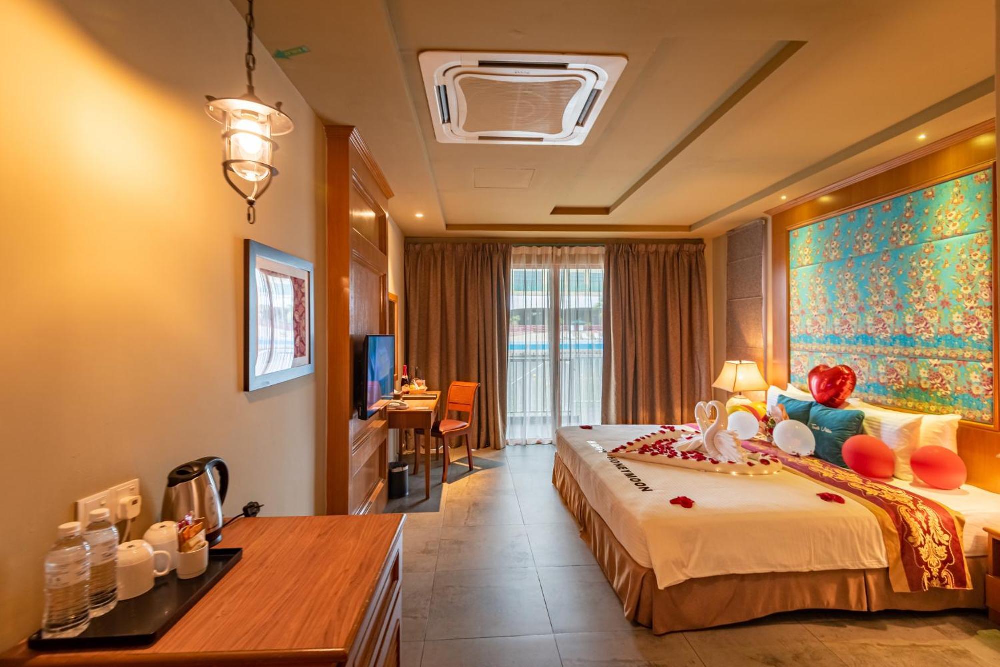 Tasik Villa International Resort Porto Dickson Exterior foto Deluxe Room